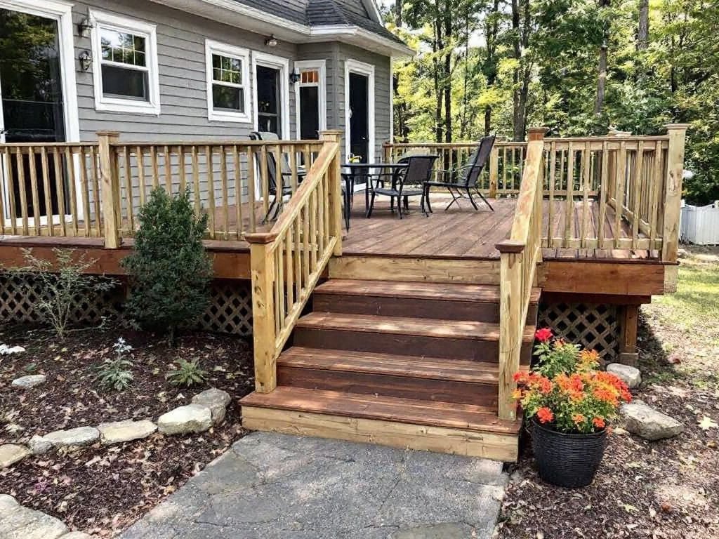 Caption: Experience comfort and style combined in this outstanding deck installation in Ashland MA. The modern, contemporary design proves new isn't always daunting. Elevated outdoor living space with a stellar deck installation in Ashland MA; it features a modern and contemporary design.