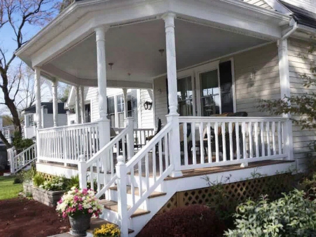 Alternative text: A beautiful renovated porch in Massachusetts highlighting outdoor living.
