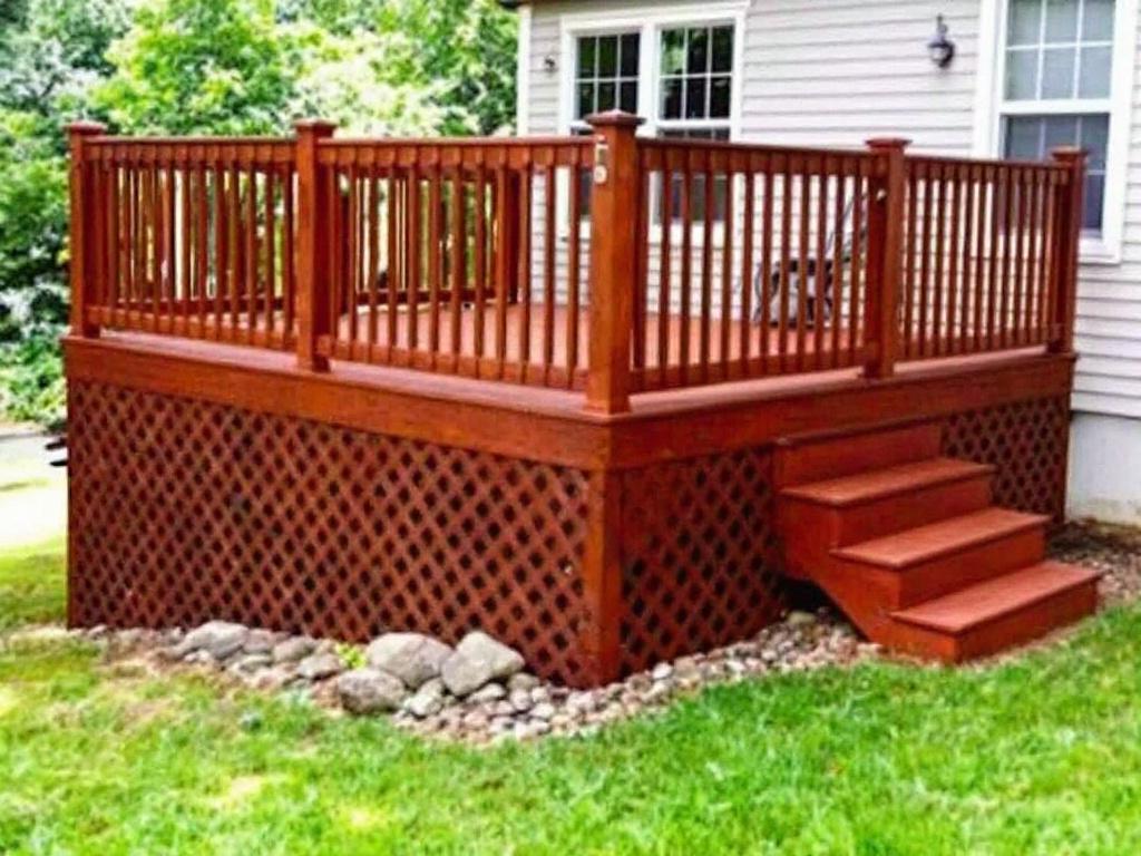 Modern and contemporary design of a top-quality deck installation in Walpole, MA, enhancing outdoor living spaces.