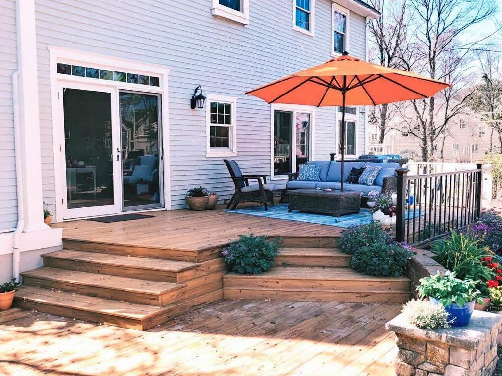 Deck installation transforming outdoor space near Sudbury MA.