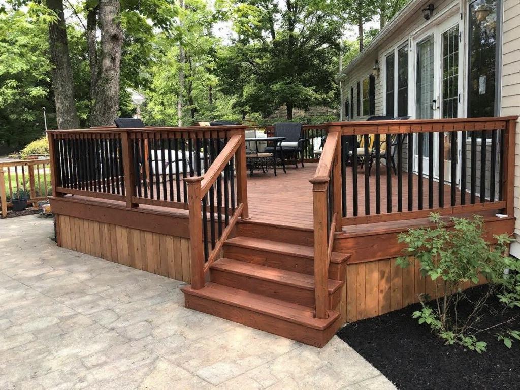 Alternative text: A sleek, modern design by deck builders in Bedford MA offering ultimate home makeover solutions.