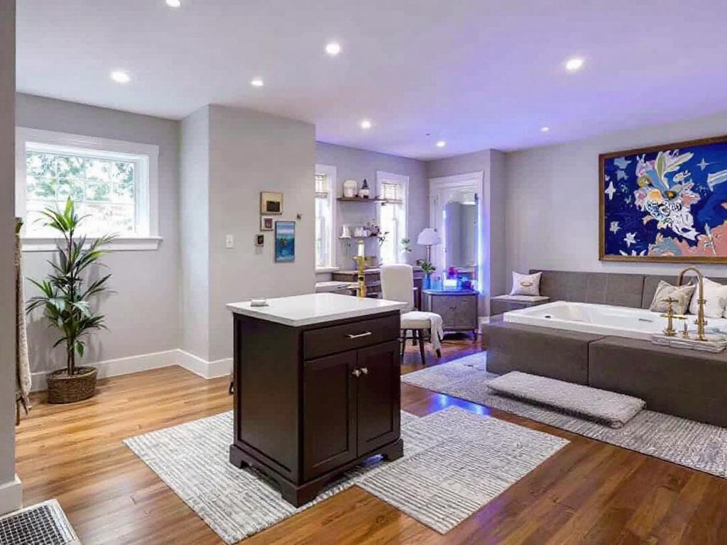 Alt Text: Look inside a beautifully remodeled basement in Medfield that exudes magic and elegance.
