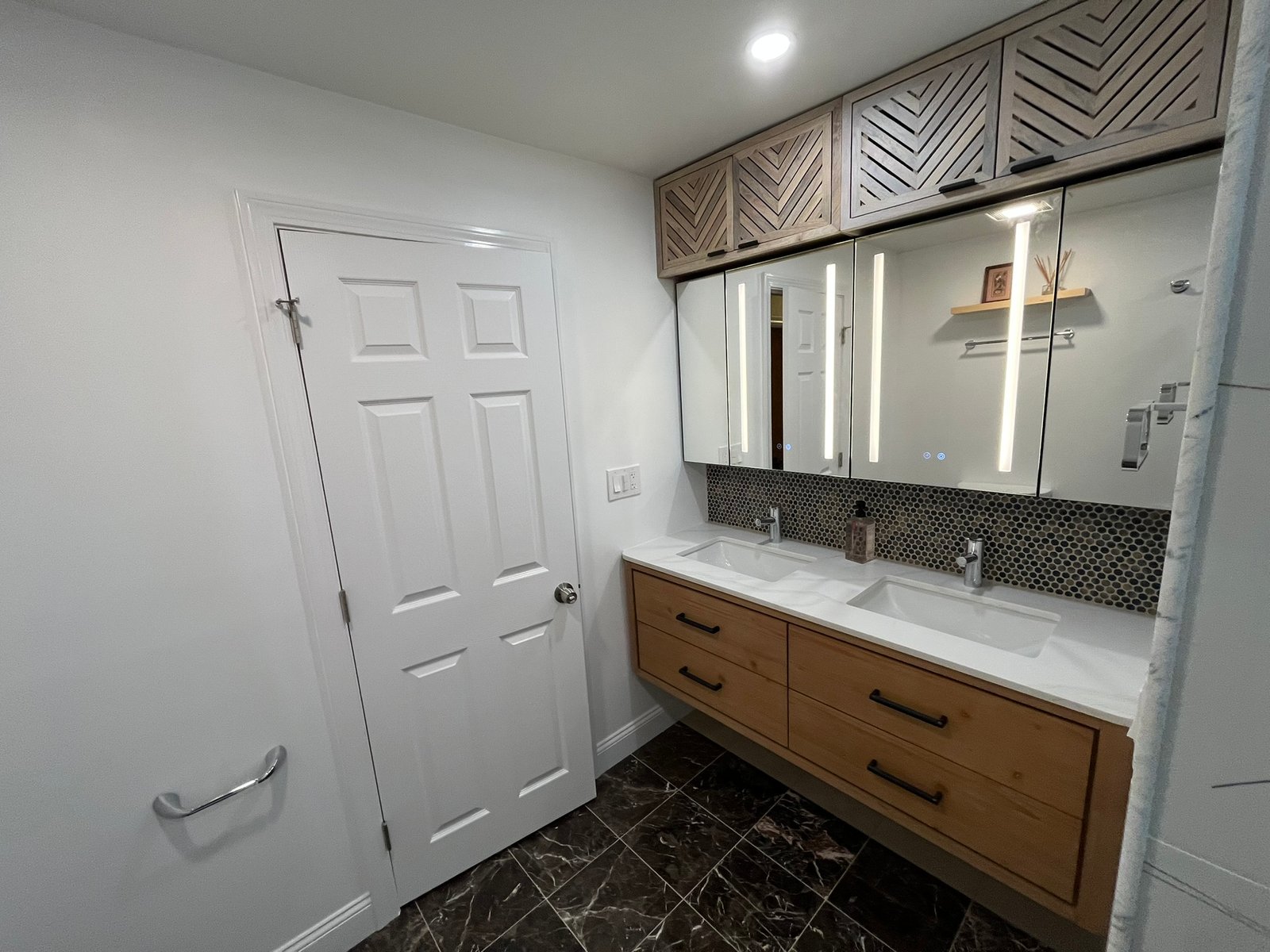 Completed bathroom remodel by Sun Shore Construction in Newton MA
